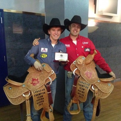 Schmidt and Flewelling with their 2013 Canadian Champion Team Roper saddles